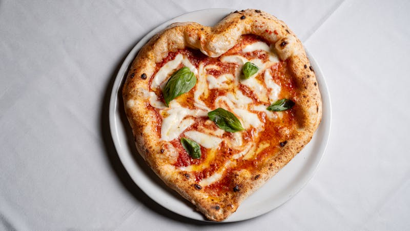 Fresh pizza being prepared for catering